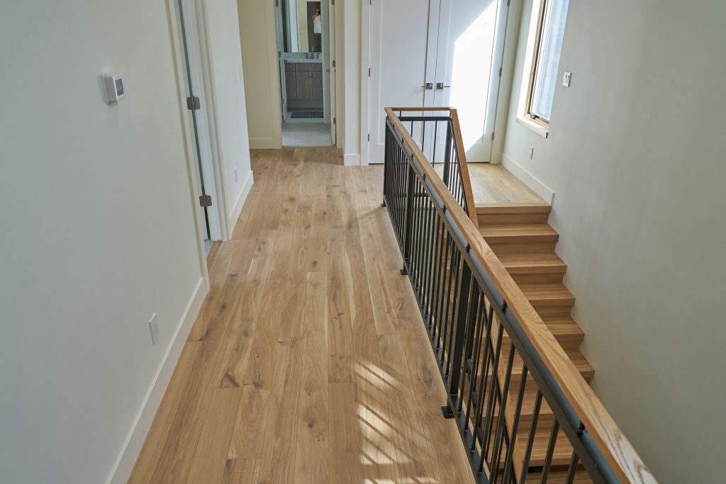 Engineered hardwood floor hallway and stairs